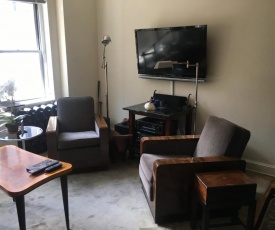 Upscale, large, high-ceilings, mid-town doorman NYC apartment centrally located